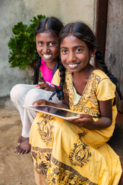 istock Sri Lankan young girls using a digital tablet 2199328326