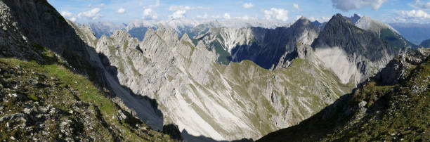 istock Panoramic view Freyungen mountains  from Nordlinger hut on Karwendel Hohenweg, Austria 2199339982