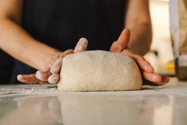 istock Preparing dough for baking. Healthy sourdough bread 2199341486