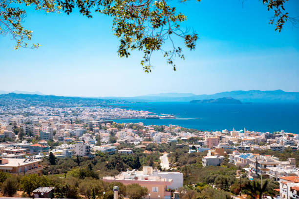 Downhill to residential rooftops of coastal town Rethimno on Crete
