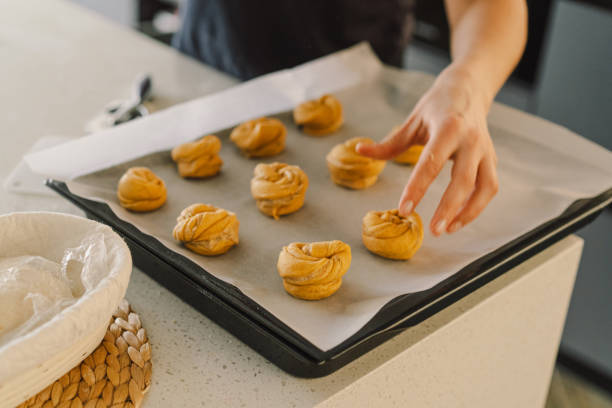 istock Woman prepares dough for baking 2199347186