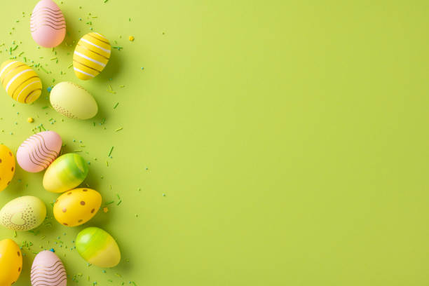 istock Colorful Easter eggs arranged on a pastel green background symbolizing spring and celebration 2199347809