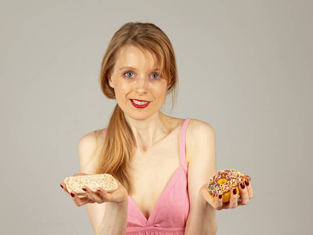 istock Pretty woman making right food choices 2199351677