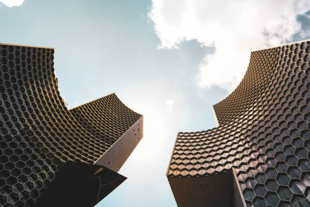 istock Futuristic Architecture with Honeycomb Design Facades 2199352050