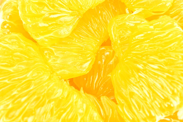 Close-Up Of Fruits In Basket On White Background