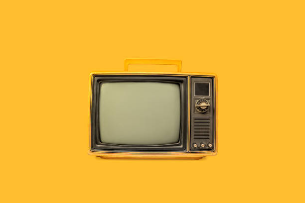 istock Retro yellow old television with blank screen isolated on yellow background, front view 2199353802