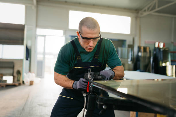 istock Young man in a glass factory 2199354911