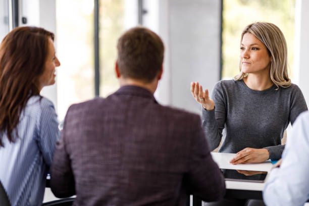 istock Smiling candidate talking to human resource team on a job interview. 2199355536
