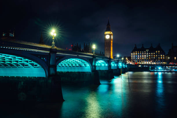 Westminster bridge and elizabeth tower, also known as big ben, create a stunning nightscape in london