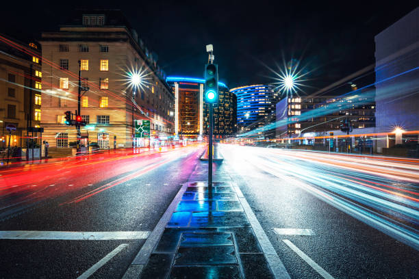 istock Light trails illuminating london's vibrant streets at night 2199358205