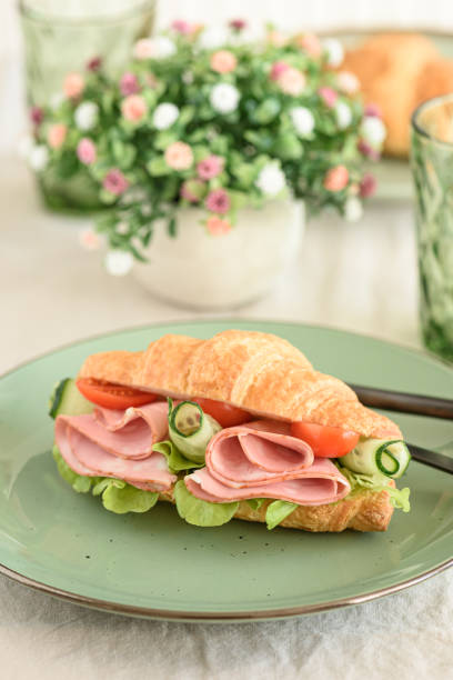 Ham and Cheese Croissant Sandwich. Healthy breakfast.