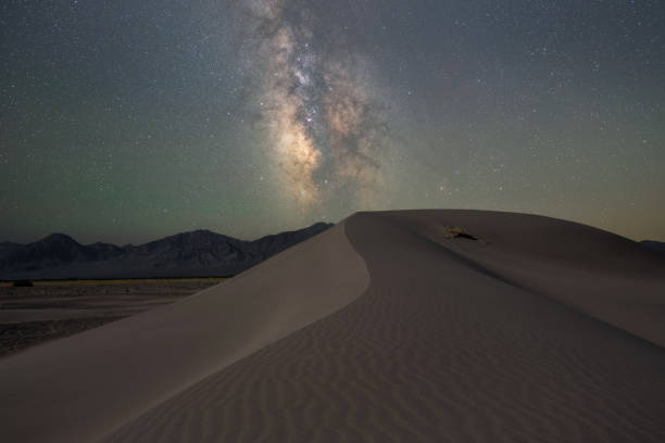 istock Big Dune Recreation Area in Nevada under the Milky Way Galaxy 2199367011