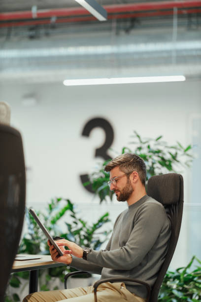 istock Modern Businessman Working in Contemporary Office Space 2199368359