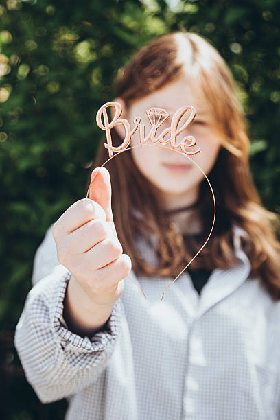 Female bride accessories, hair holder. The inscription bride on the headband. Female bride accessories, hair holder. The inscription bride on the headband. Wedding decoration, accessories for a bachelorette party, wedding hoop. Female hoop, hairpin for the bride to be party. hoops wedding stock pictures, royalty-free photos & images