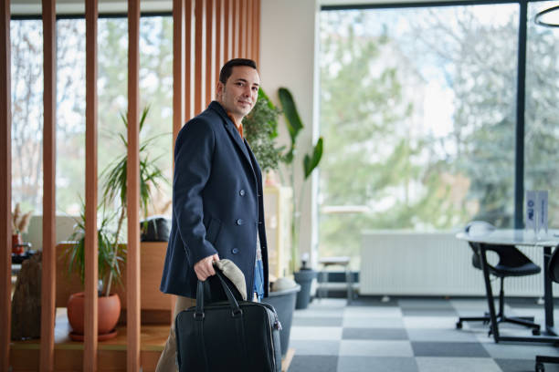 istock Businessman ready to leave the office. 2199374773