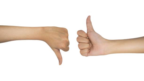 istock Hands showing different gesture thumb up and thumb down isolated on white background. 2199375765