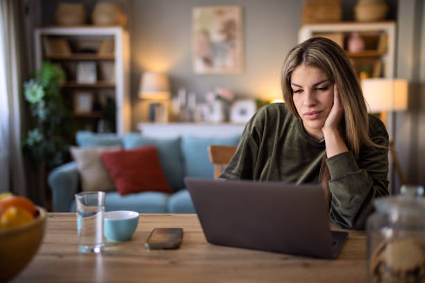 istock Young Woman  working on laptop 2199381763