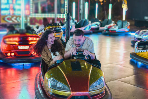 istock Boyfriend Looking Worried and Tense Avoiding Bumper Car Collision at Last Moment 2199385346