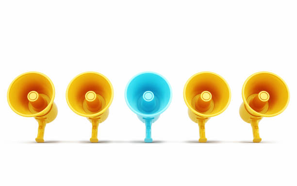 istock Turquoise Megaphone Selected Among Rows of Yellow Megaphones, Object + Shadow Clipping 2199388146