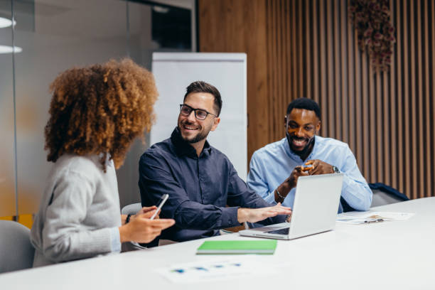 istock Business team collaborating on a project, discussing strategy in a meeting 2199394865
