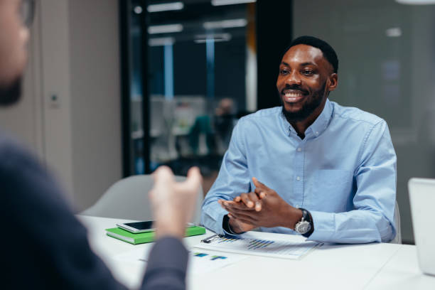 istock Young businessman having a conversation during a business meeting 2199394927