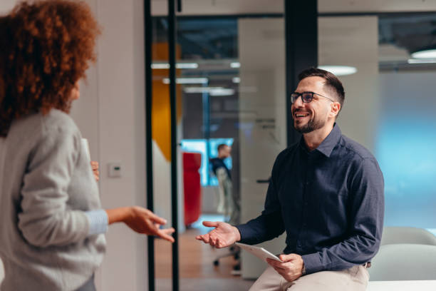 istock Business partners discussing new project in modern office 2199395013