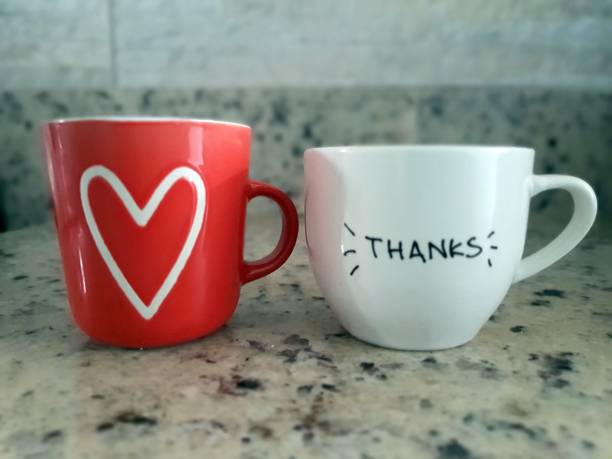 istock Coffee cup with white heart and Thanks inscription 2199395245