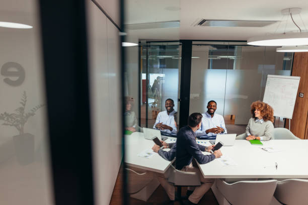 istock Business team discussing during a meeting in a modern office 2199395254