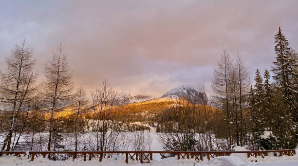 istock Golden Hour in a Snowy Mountain Landscape 2199400706