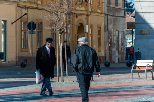 Timisoara, Romania - March 15, 2018: Man walking on the street. Real people.