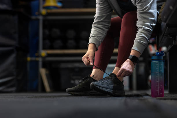 istock Tying Shoelaces at the Gym 2199403521