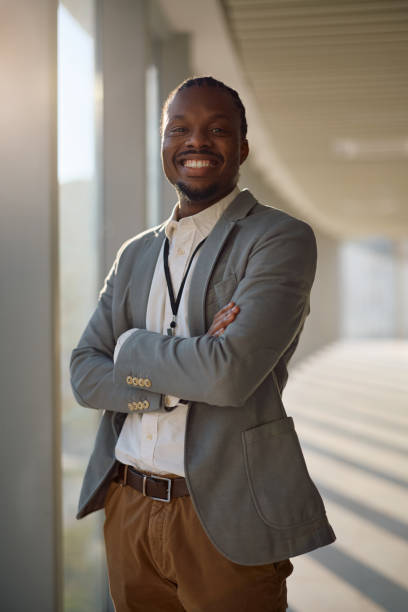 istock Confident black businessman at corporate office looking at camera. 2199415478