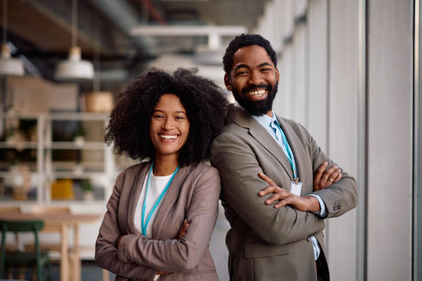 istock Successful black business colleagues in the office looking at camera. 2199415760