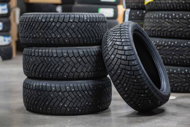 istock New car studded tires in the store. 2199417698