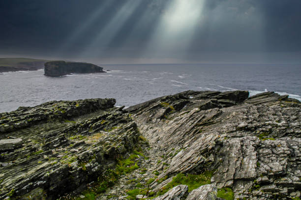Streams of Sunlight Over the Cliffs on Dingle Peninsula in Ireland