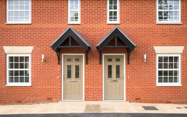 istock Front door of new build homes, housing development, UK 2199422043