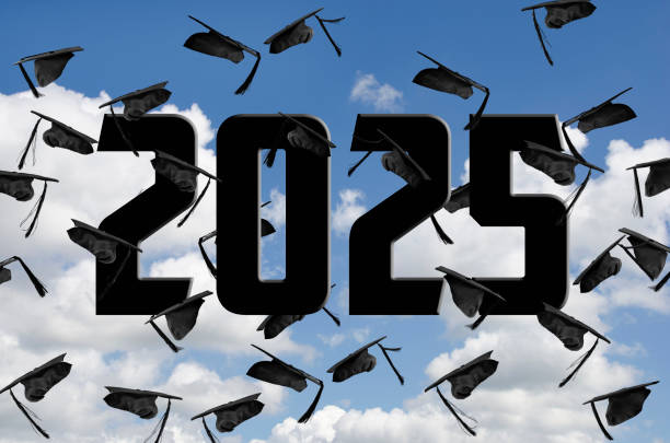istock Airborne 2025 Black Graduation Caps In Sky 2199426949