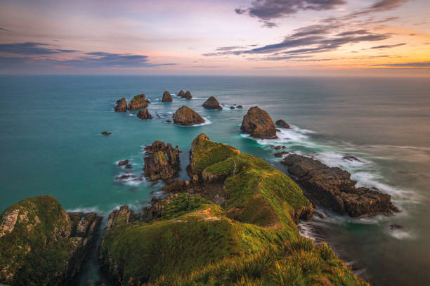 istock Coastal Marvels of Nugget Point, New Zealand 2199428795