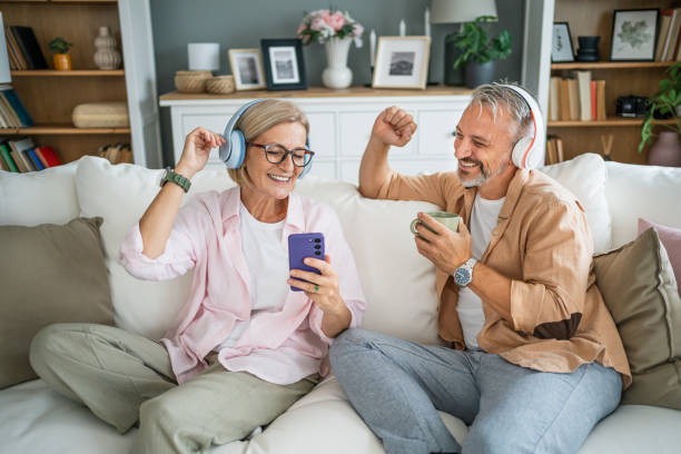 istock Relaxing and listening to music 2199429632