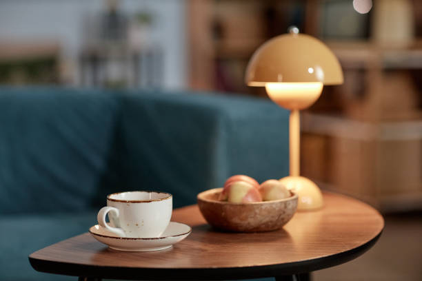 istock White Ceramic Cup with Saucer Placed on Tea Table in Living Room 2199429962