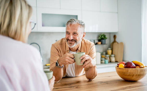 istock Mature couple enjoying the morning together 2199429994