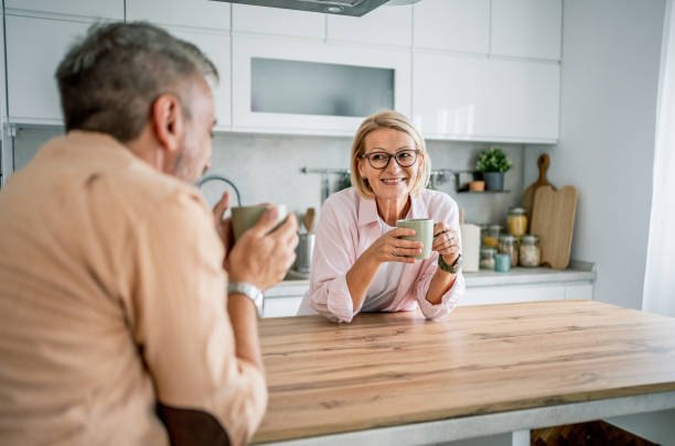 istock Mature couple enjoying the morning together 2199430659