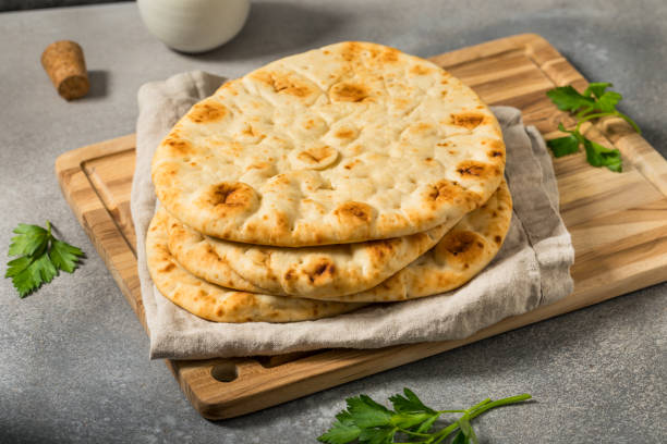 istock Homemade Warm Buttery Indian Naan Bread 2199430917