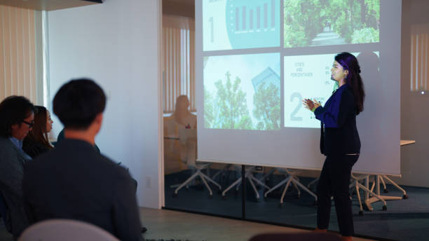 istock Young Multi-Racial Businesswoman Presenting in a Sustainable Office Environment 2199437231