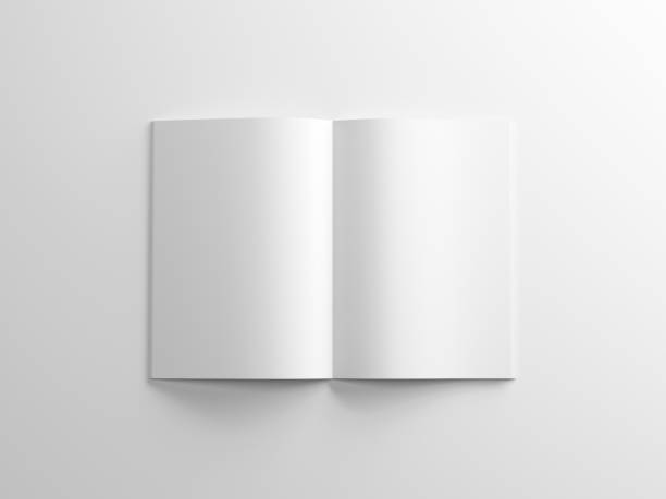 istock Top view of open magazine A4 mockup on the floor with shadows 2199439562