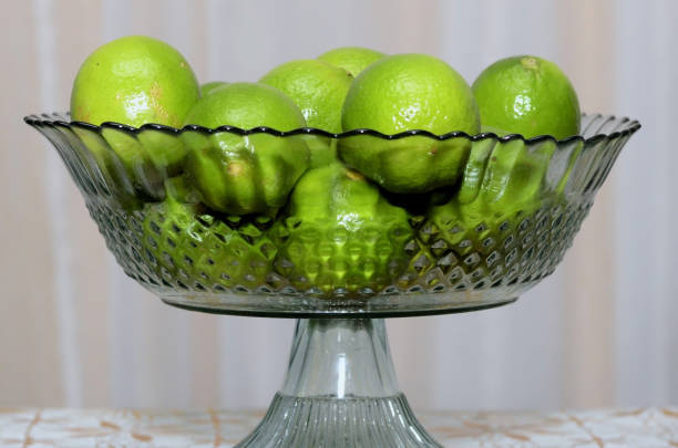 Limes on wooden table