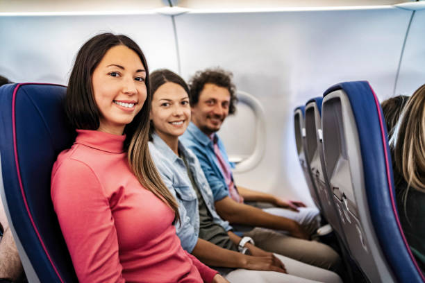 istock Group of friends smiling during a flight to Malmo, Sweden 2199456481