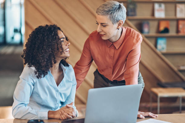 istock Two businesswomen in the office 2199460122