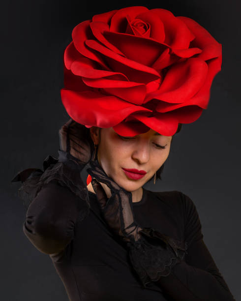 istock Woman with a red rose on her head 2199462227