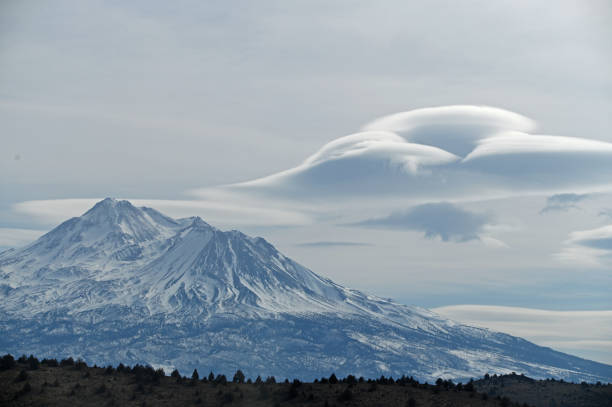 istock Lenticular clouds over snow covered Mount Shasta mountain 2199462233